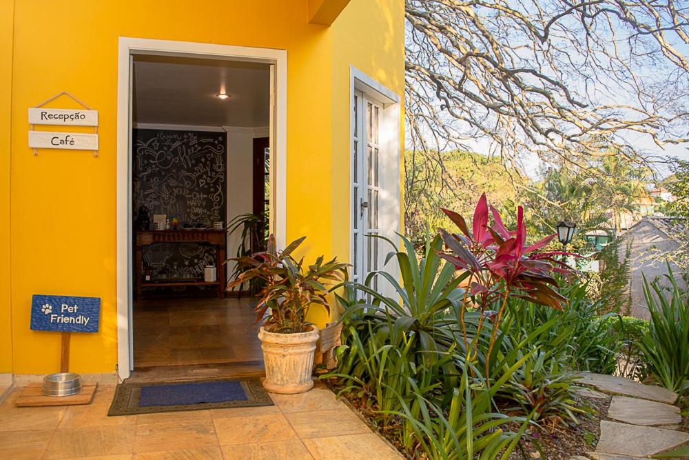 Pousada Villa Bella - Recepção - entrada com placa petfriendly